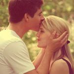 man-kiss-forehead-couple